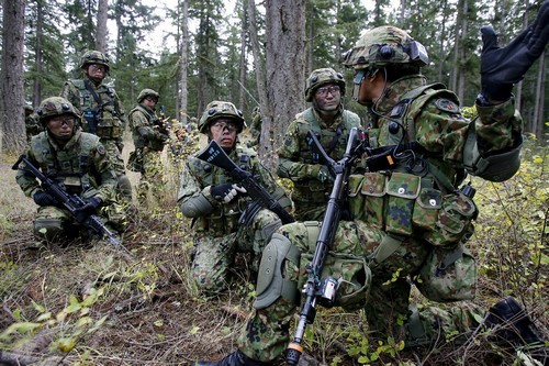 PHIL SUSSMAN Japanese soldiers from the 22nd Infantry Regiment of the Japan Ground Self-Defense Force train in urban assault with American Soldiers from 1st Battalion, 17th Infantry Regiment, 5th Brigade Oct. 17, 2008 during a bilateral exercise at Fort Lewis' Leschi Town.