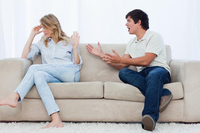 young-couple-arguing-on-a-sofa-136381366849303901-130702114836
