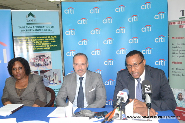 1.Kutoka kushoto ni Katibu Mtendaji wa taasisi ya kifedha (TAMFI), Winnie E.Terry,Mkurugenzi Mkuu wa Citi Bank, Joseph Carasso na Ofisa Mahusiano wa ,Frank Kallaghe.