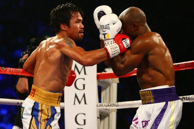 Manny-Pacquiao-lands-a-punch-against-Timothy-Bradley