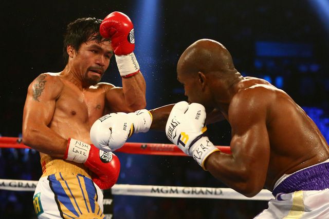 Timothy-Bradley-moves-in-to-land-a-punch-against-Manny-Pacquiao