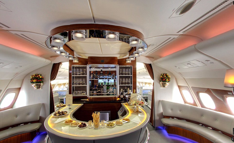 the_plane_boasts_a_fully_functioning_bar_and_seating_area_for_th-a