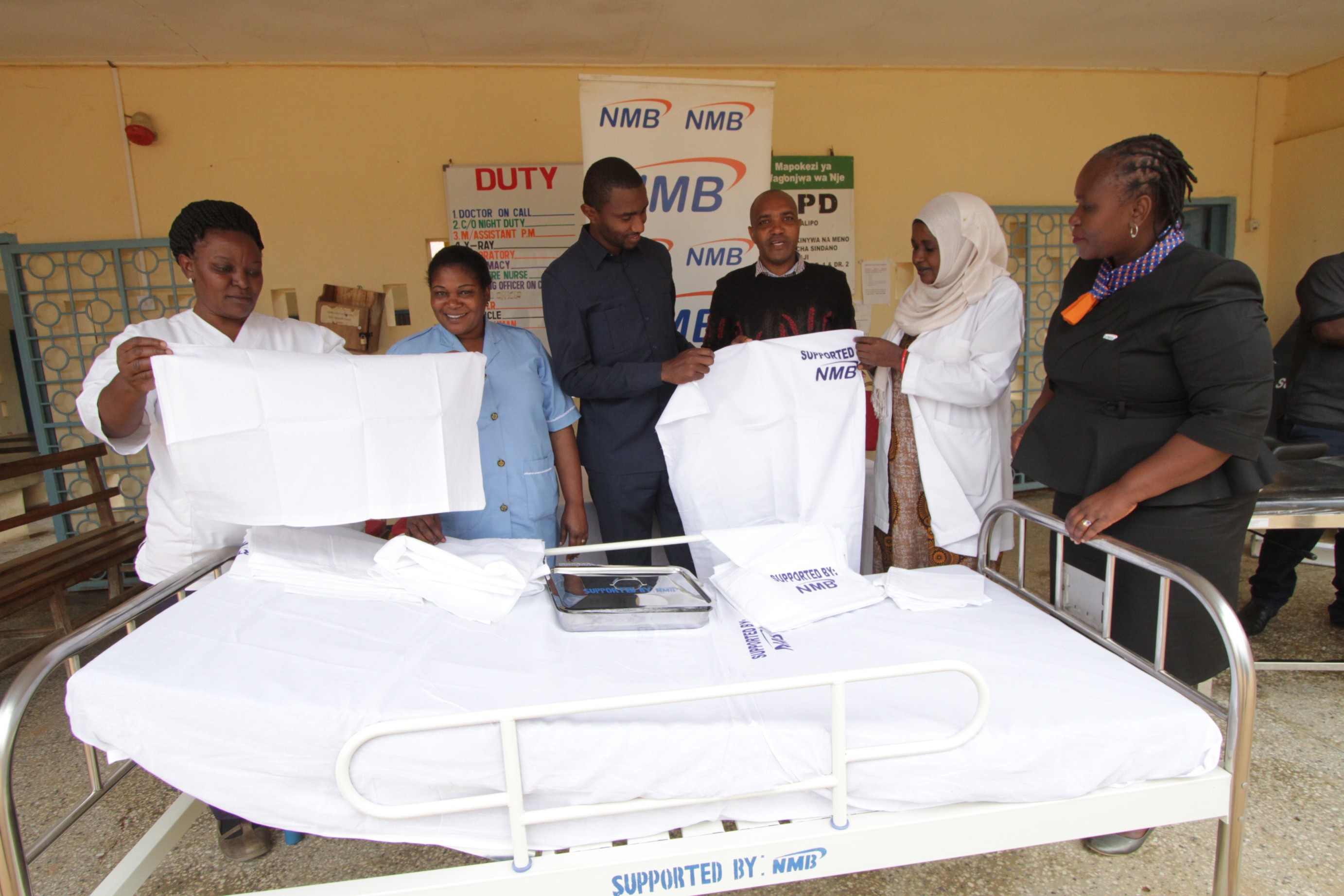 NMB yatoa Msaada wa Madawati, Vifaa Tiba Mikoa Ya Morogoro, Simiyu na Manyara - Global Publishers