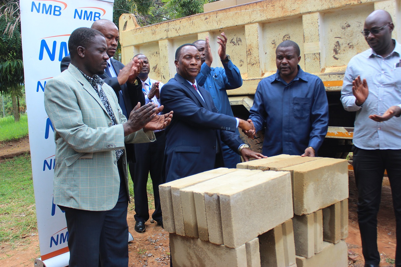 NMB Yatoa Msaada Kusaidia Ujenzi Uwanja wa Mpira Chato - Global Publishers