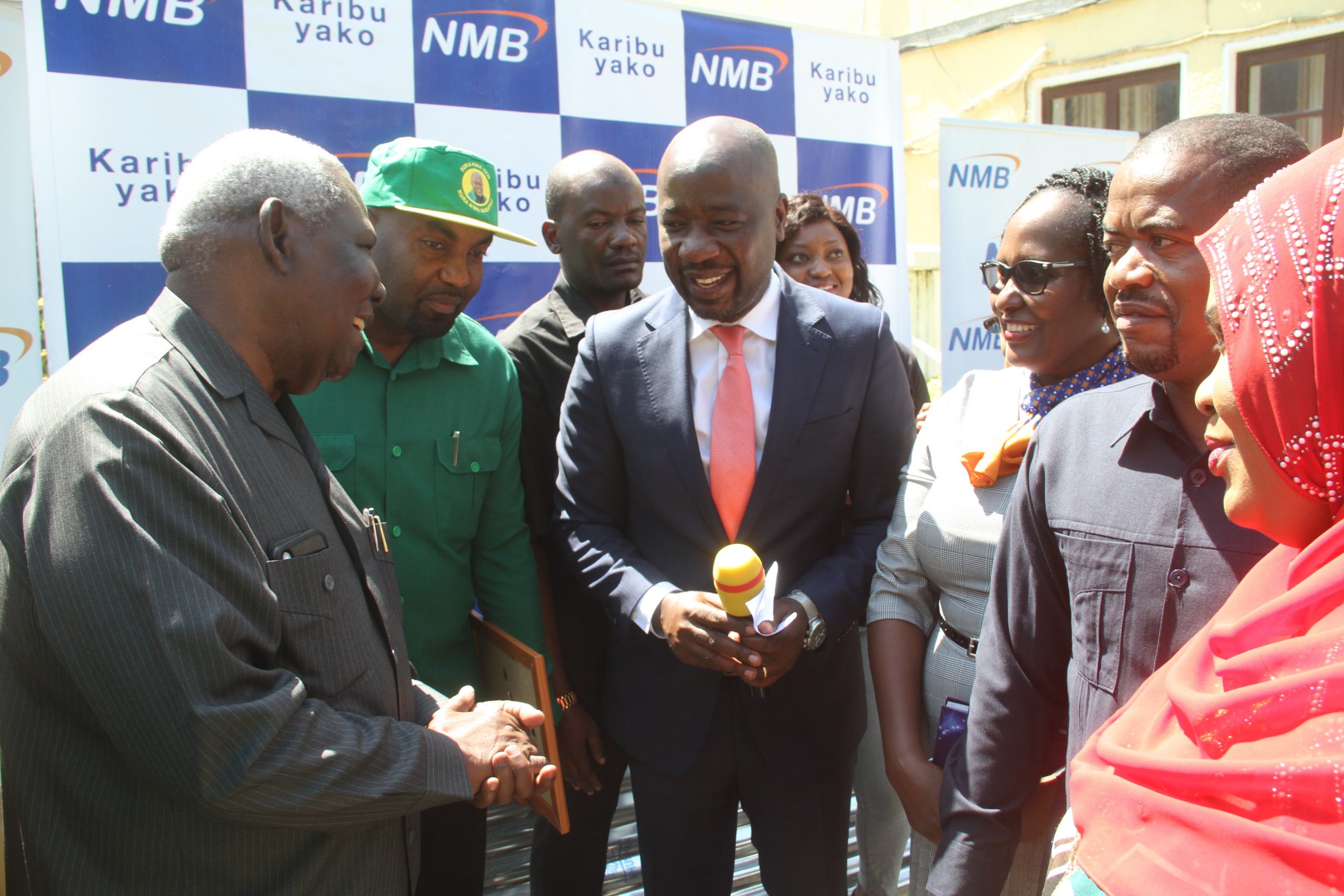 Balozi Seif Ali Idd Apokea Msaada wa Mabati 216, Mbao 333 Kutoka Nmb - Global Publishers