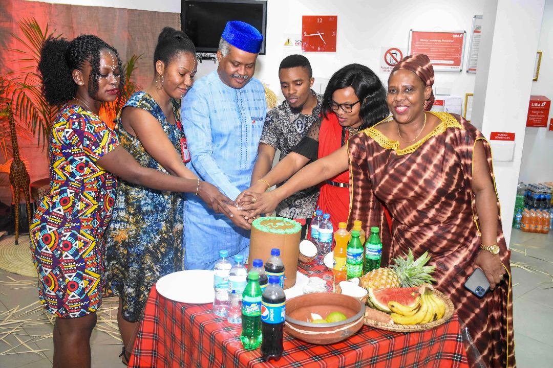 Wafanyakazi  Wakata Keki Maadhimisho Siku ya UBA Afrika 2021 - Global Publishers