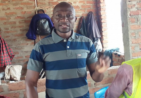 DED Aliyenusurika Mbele ya JPM, Asimamishwa kwa Tuhuma za Wizi wa Mabati - Global Publishers